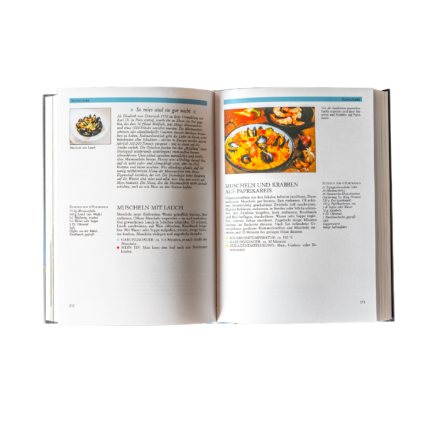 Open cookbook with two recipes for seafood and photos of the finished dishes on a white background.