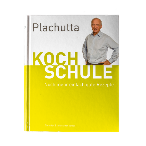 Modern carport with flat roof, wooden ceiling and tiled floor under blue sky, partially visible tree.